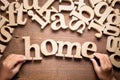 Child`s Hand Arrange Home Word