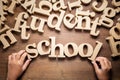 Child`s Hand Arrange School Word Royalty Free Stock Photo