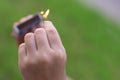 Child`s hand with blurred burning match and matchbox Royalty Free Stock Photo