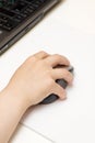 Child's Hand with Computer Mouse Royalty Free Stock Photo