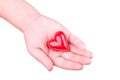 A child`s hand holding red heart isolated on white background Royalty Free Stock Photo