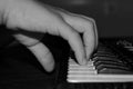Child`s hand on the keyboard of the instrument Royalty Free Stock Photo