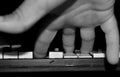 Child`s hand on the keyboard of the instrument Royalty Free Stock Photo