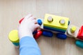 Child`s hand with a toy Royalty Free Stock Photo