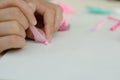 Child`s hands with colored plasticine.