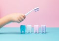 Child`s hands holding big tooth and toothbrush Royalty Free Stock Photo