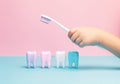Child`s hands holding big tooth and toothbrush Royalty Free Stock Photo