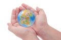 Child's hands holding jigsaw puzzle globe