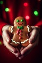 Child\'s hands holding tasty gingerbread cookies, close up view