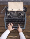 Child`s hands on vintage typewriter with clean