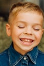 Child`s happy face . Portrait of a Cute Kid. little boy with sh Royalty Free Stock Photo