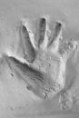 Child's little handprint cast in white plaster