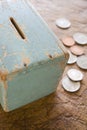 Child's Old Wooden Money Box With Coins Royalty Free Stock Photo