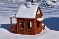 Child`s outdoor brown playhouse