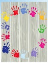 Child's Painted Hand Prints on Fence Royalty Free Stock Photo