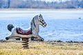 Child`s Play Horse at Park by Lake