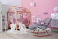 Child`s room interior with comfortable bed Royalty Free Stock Photo