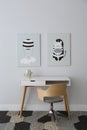 Child`s room interior with desk and cute posters Royalty Free Stock Photo