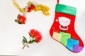 Child`s santa stocking with rd pohutukawa flower and tinsel simp