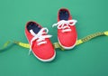 Child`s shoes measurement,pair of sneakers with centimeter,foot size measure