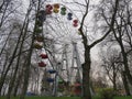 Child`s swing machine on the autumn. A toy car for children in the yard.