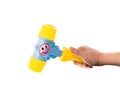 Child's toy hammer in hand Royalty Free Stock Photo