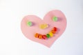 A child`s Valentine`s day heart with candy smile