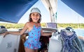 Child on sailing boat yacht summer vacation adventure Royalty Free Stock Photo