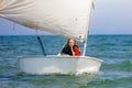 Child sailing. Kid learning to sail on sea yacht Royalty Free Stock Photo