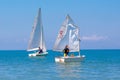 Child sailing. Kid learning to sail on sea yacht