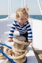 Child sailor. Boy sailor travelling sea. Boy sailor striped shirt sea yacht travel around world. Little sea traveller