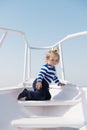 Child sailor. Boy sailor travelling sea. Boy sailor striped shirt sea yacht travel around world. Little sea traveller