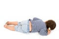 Child in sailor's striped vest lying down