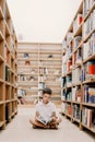 Child in school library. Kids read books. Little boy reading and studying. Children at book store. Smart intelligent preschool kid Royalty Free Stock Photo