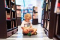 Child in school library. Kids reading books Royalty Free Stock Photo