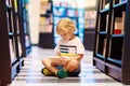 Child in school library. Kids reading books Royalty Free Stock Photo