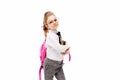 Child with schoolbag. Girl with pink school bag isolated on white. Royalty Free Stock Photo