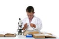 Child scientist looking at microscope slide Royalty Free Stock Photo