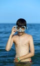 Child at sea with diving mask Royalty Free Stock Photo