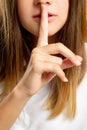 Child secret hush gesture keep quiet girl shhh Royalty Free Stock Photo