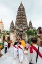 Child and senior Buddhists pilgrim to historical place, Mahabodhi Temple at Bodh Gaya, Bihar, India