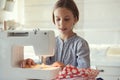 Child sewing