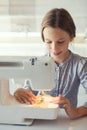 Child sewing Royalty Free Stock Photo