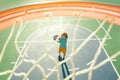 Child shooting Basketball ball and playing basketball, lower view wide angle.