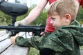 Child shoots paintball gun