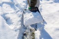 Child shoveling and removing snow Royalty Free Stock Photo