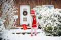 Child shoveling winter snow. Kids clear driveway. Royalty Free Stock Photo