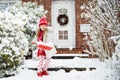 Child shoveling winter snow. Kids clear driveway Royalty Free Stock Photo