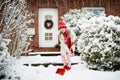 Child shoveling winter snow. Kids clear driveway