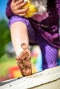 Child is showing dirty feet from playing in mud Royalty Free Stock Photo